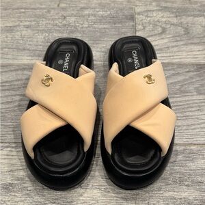 Chanel beige black Rev criss cross puffy CC logo slide sandals